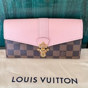 Louis Vuitton Clapton pink and Brown wallet.